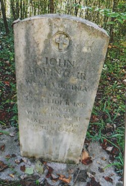 The grave of John Boring, an American soldier who fought in Normandy during the Second World War.